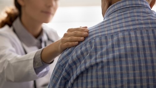 Female GP doctor giving empathy, support to senior 80s sick man, touching shoulder. Elderly male patient getting bad news, geriatric disease, pessimistic diagnosis from therapist. Banner