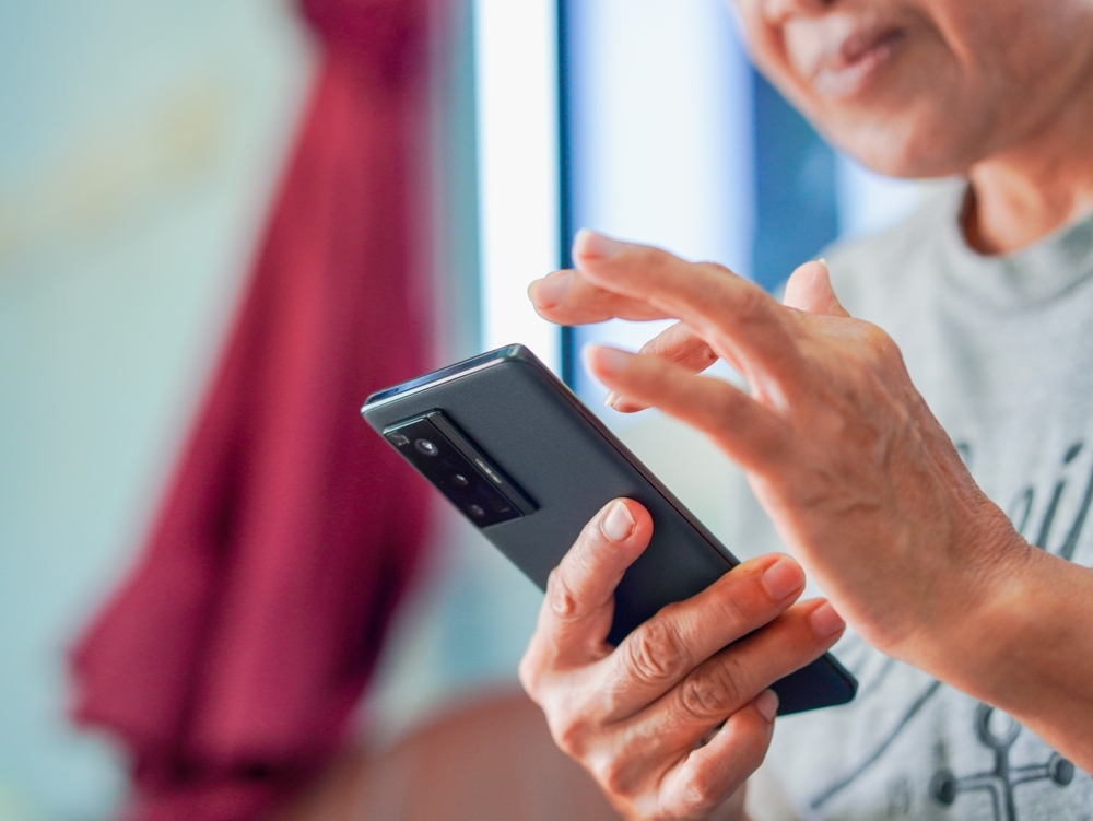 Close up hand people using smartphone browsing internet, business, text or online shopping. Senior woman use mobile phone AI chat bot and communication family. Female touch screen phone social media